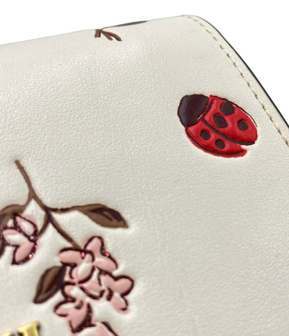 COACH 二つ折り財布 レディバグ フローラルプリント レディース コーチ