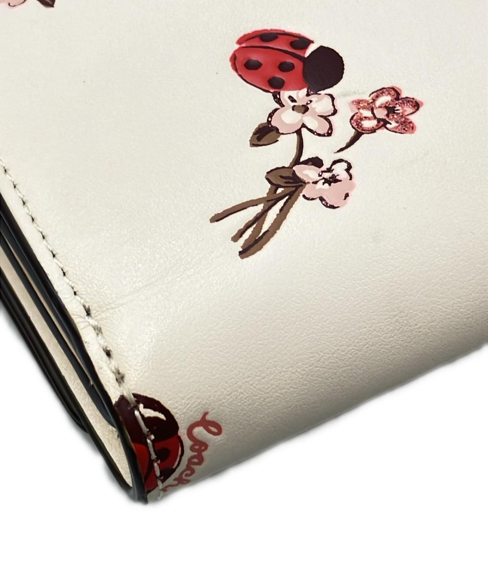 COACH 二つ折り財布 レディバグ フローラルプリント レディース コーチ