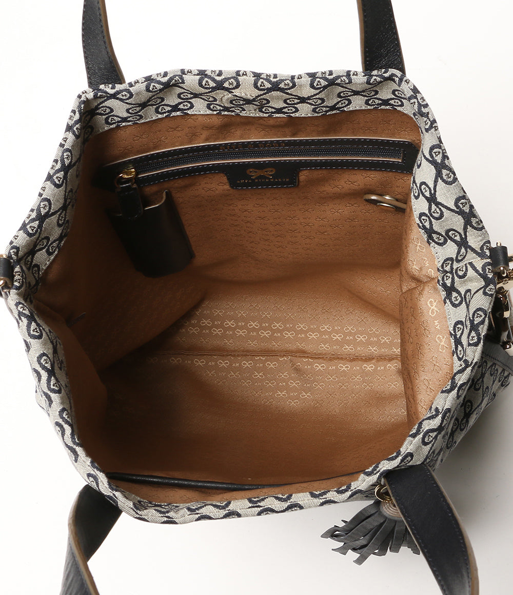 ANYA HINDMARCH トートバッグ リボン柄モノグラムキャンバス タッセル 2way レディース アニヤ・ハインドマーチ
