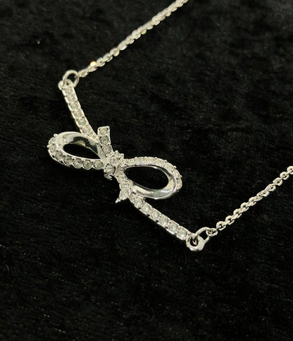 美品 スワロフスキー ネックレス リボンモチーフ レディース SWAROVSKI