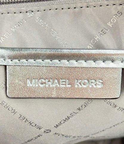 リュック MKシグネチャー レディース