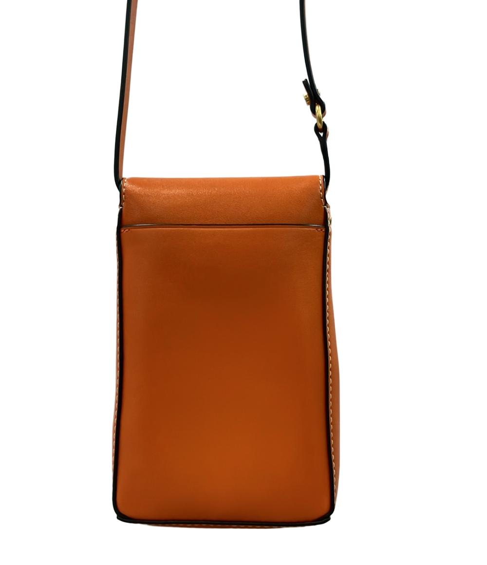 トリーバーチ　クラッチバッグ　TORYBURCH 籐 かご オレンジ 金ロゴ トリーバーチ クラッチバッグ TORYBURCH 籐 かご オレンジ 金