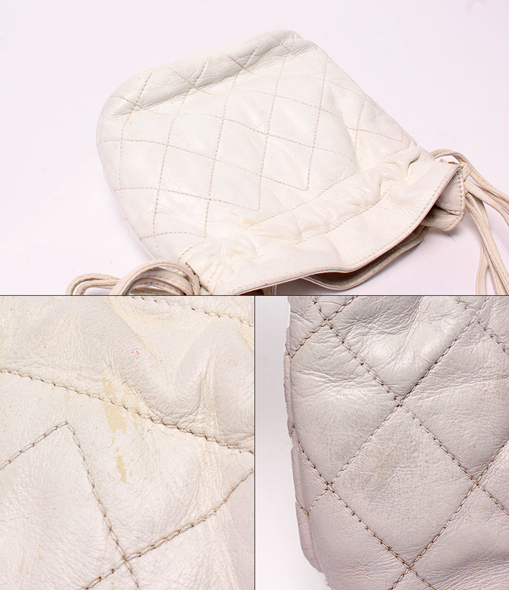 CHANEL ショルダーバッグ 肩掛け 斜め掛け ゴールド金具 1番台 巾着 マトラッセ レディース シャネル