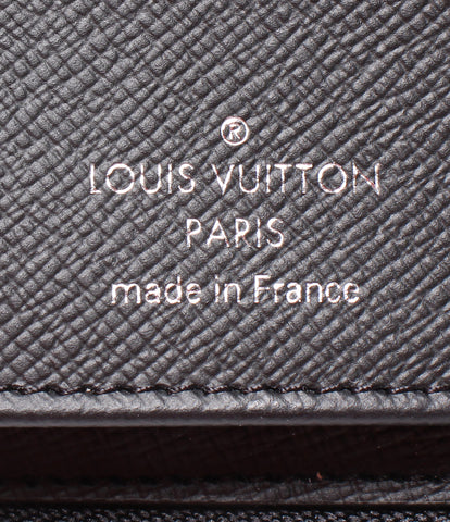 ルイヴィトン 美品 ラウンドファスナー長財布 ジッピーウォレット ヴェルティカル ダミエグラフィット   N63095 メンズ  (ラウンドファスナー) Louis Vuitton