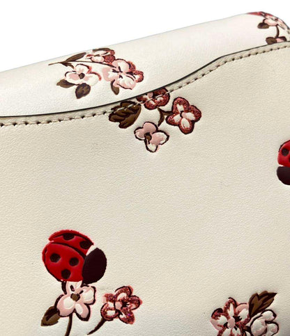 COACH 二つ折り財布 レディバグ フローラルプリント レディース コーチ