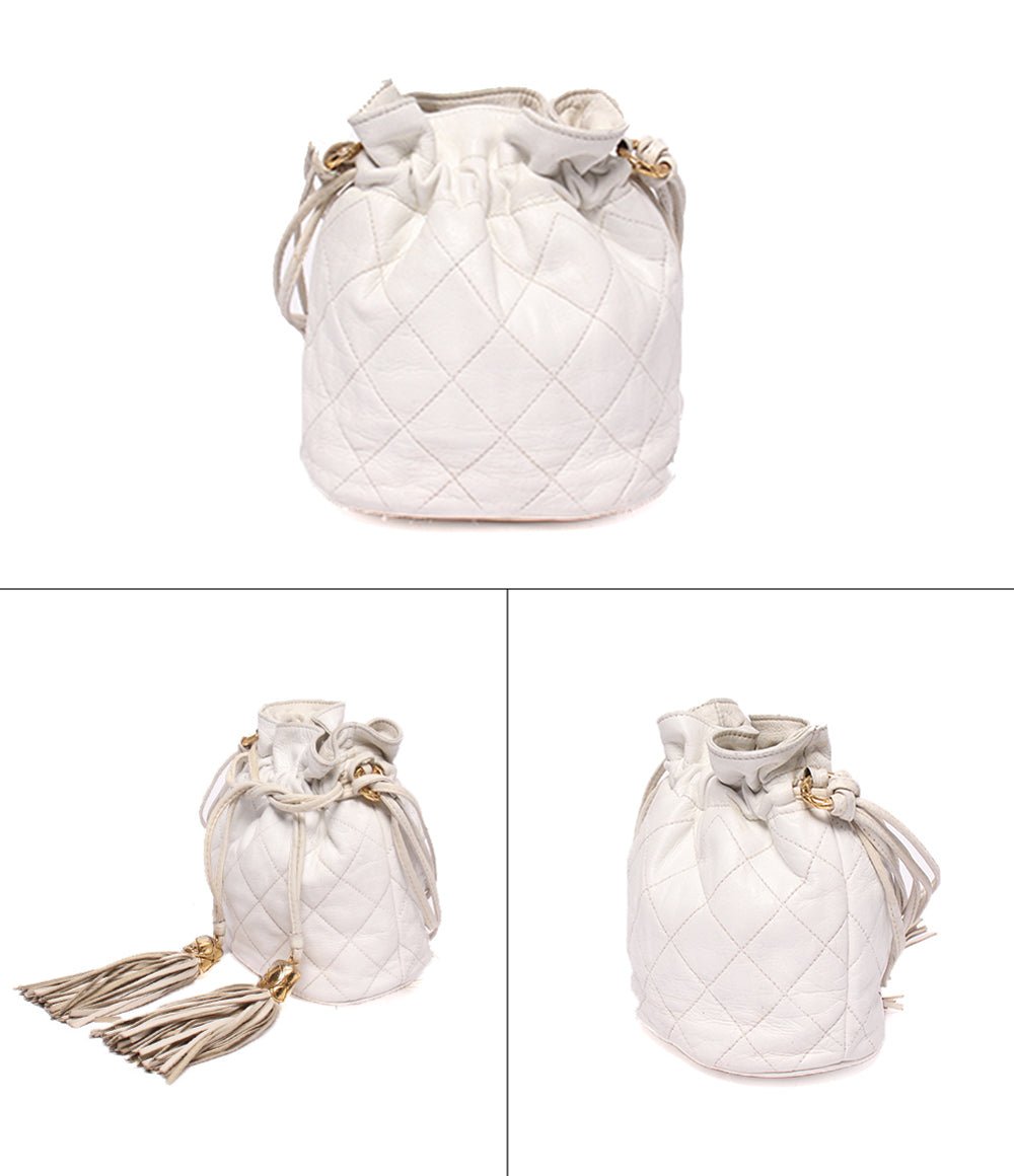 CHANEL ショルダーバッグ 肩掛け 斜め掛け ゴールド金具 1番台 巾着 マトラッセ レディース シャネル