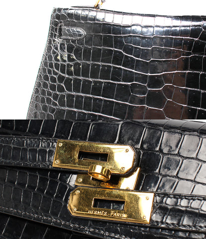 Hermes leather handbag ○ V engraved Porosasu black × gold metal fittings Kelly 32 Ladies HERMES