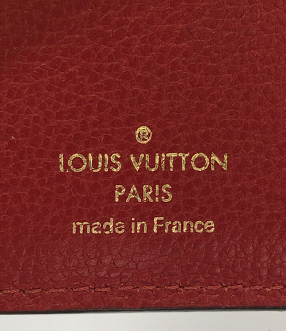 ルイヴィトン  三つ折り財布 ポルトフォイユ ヴィクトリーヌ モノグラムアンプラント スカーレット   M63701 レディース  (2つ折り財布) Louis Vuitton