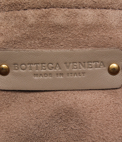 Bottega veneta手提包背部手中的女性bottega veneta