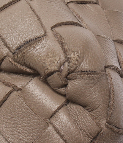 Bottega veneta手提包背部手中的女性bottega veneta