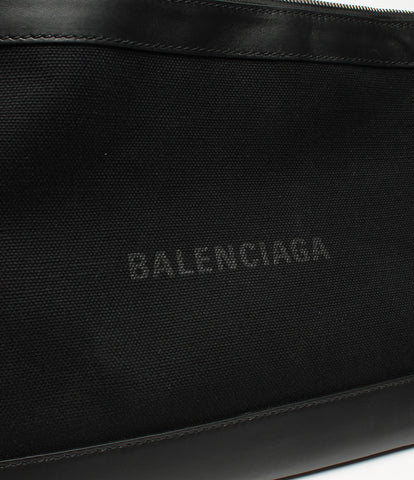 Valenciaga กระเป๋าคลัทช์ผ้าใบโลโก้ผู้ชาย Balenciaga